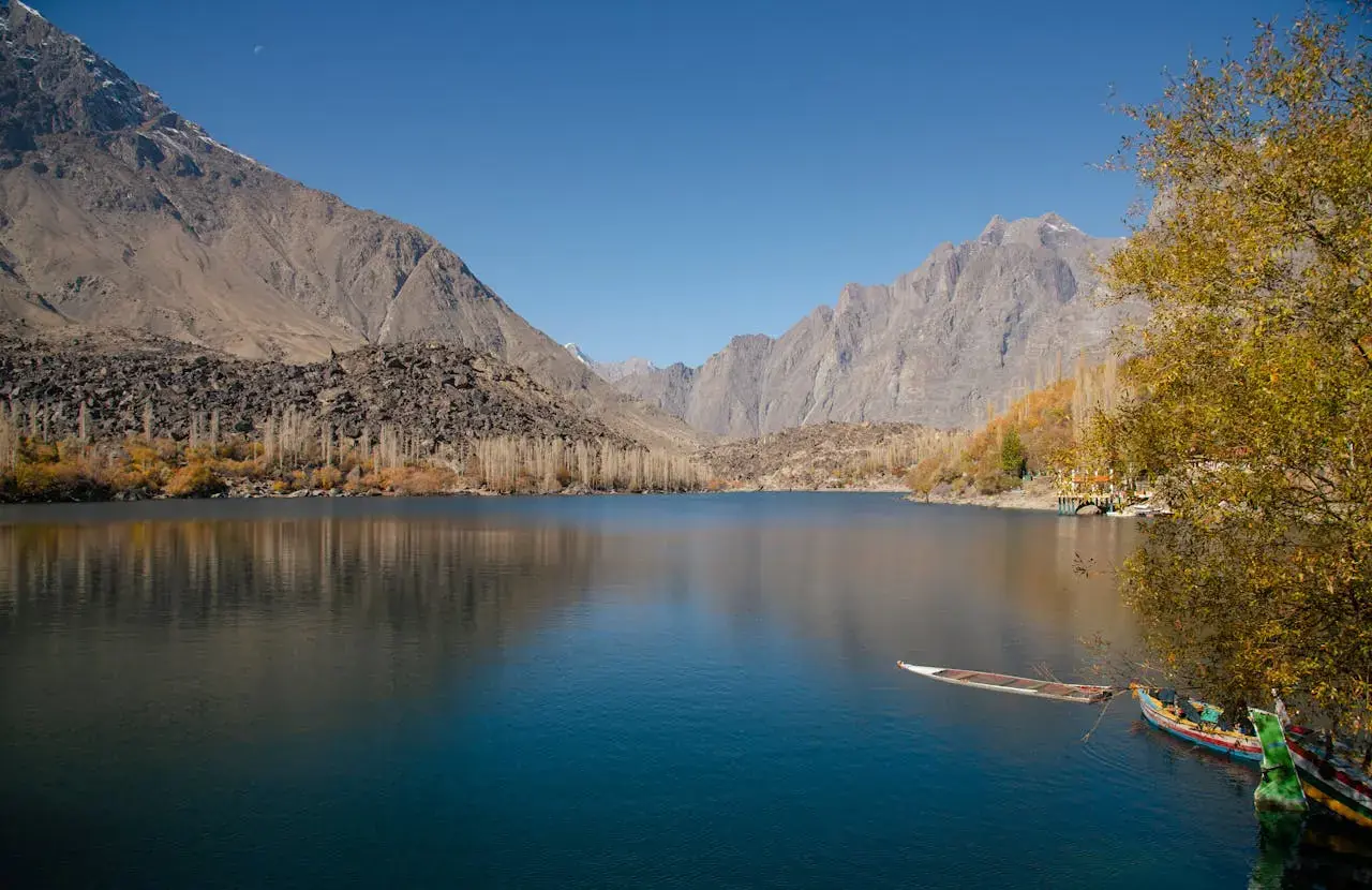 Scenic view of a tranquil lake with majestic mountains in Skardu