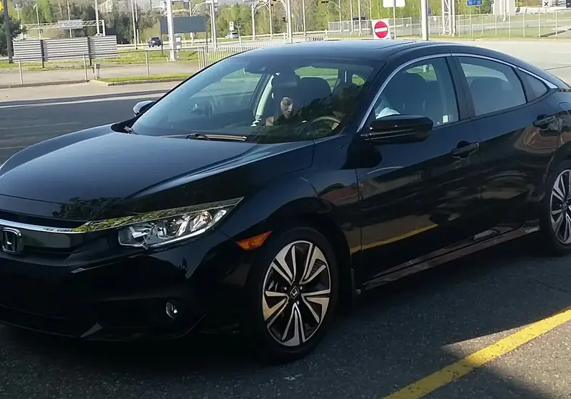 A sedan car suitable for comfortable highway travel