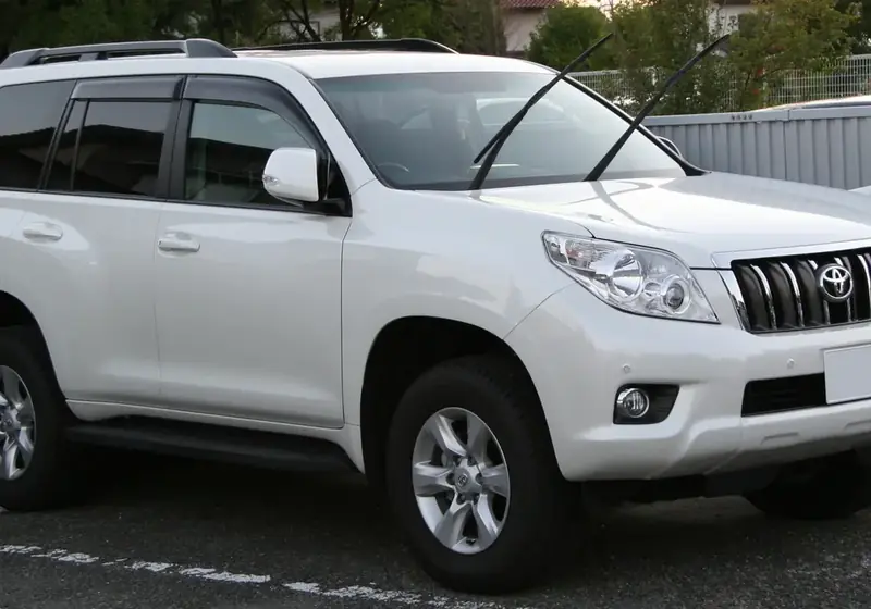 A 4x4 SUV on rocky mountain terrain